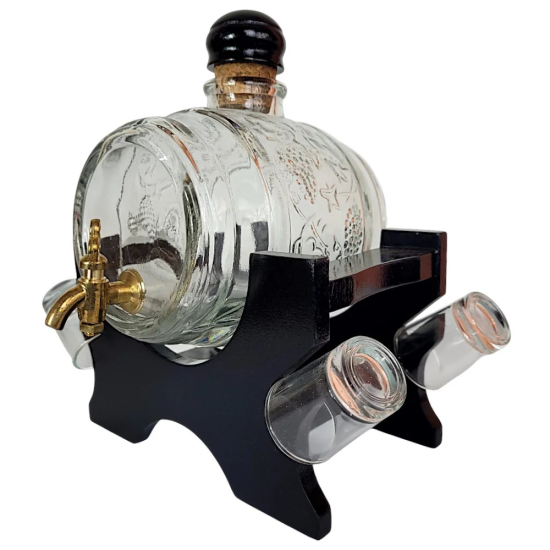 Стъклено буре за алкохол с месингова канелка върху черна MDF стойка